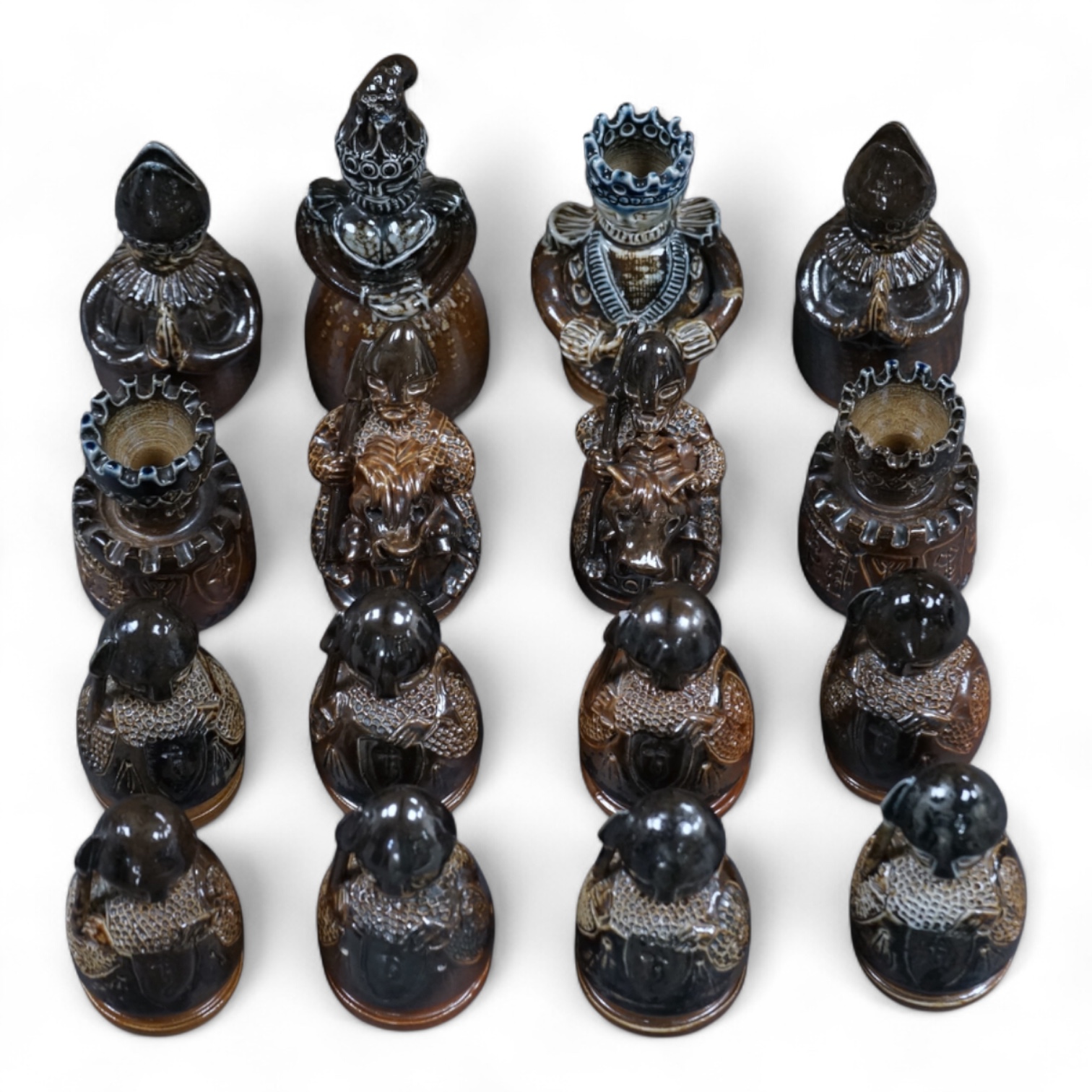 Guy Sydenham (1916-2005), a set of 16 black side chess pieces, tallest 11cm